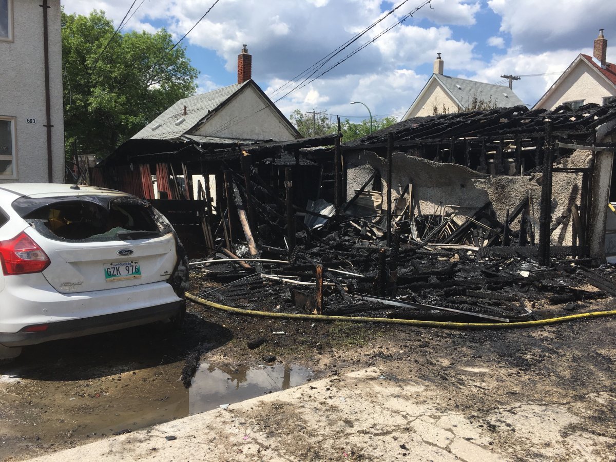 A garage and carport were destroyed by a fire on Agnes Street Wednesday.