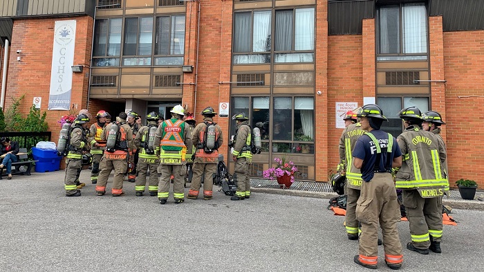 Firefighters on scene of a three-alarm fire at a long-term care home in Scarborough