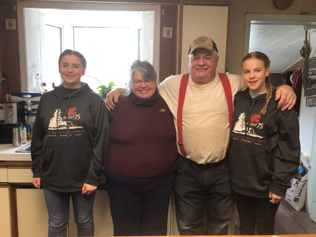 Brook and Amanda Hanik with Larry Branton, nephew of Gordon and Ronald, and Larry’s wife Dawna.