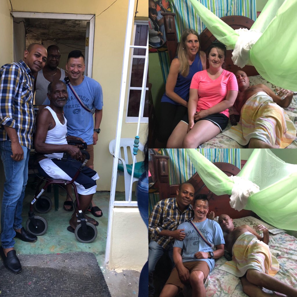 Macdonald High students pose with members of the community who received wheelchairs and walkers.