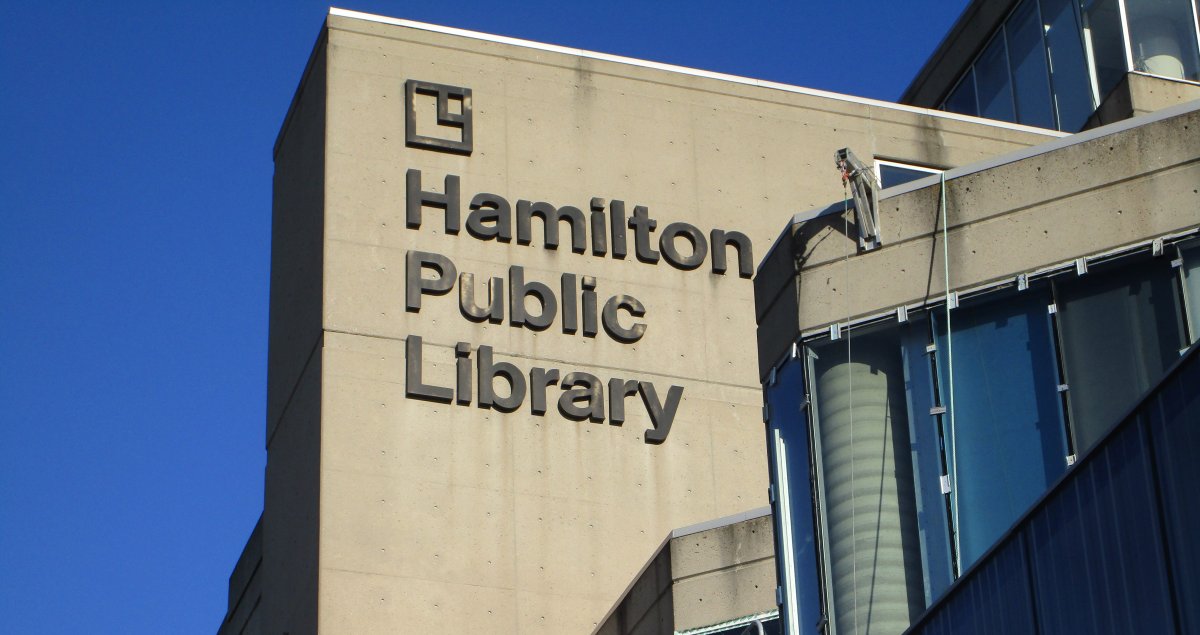 Hamilton's central library branch is one of four that opens Tuesday for takeout service.