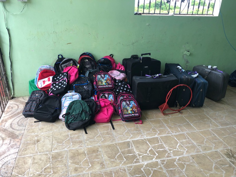 Macdonald High School students brought 114 school bags and four suitcases full of school supplies to a small Dominican village
