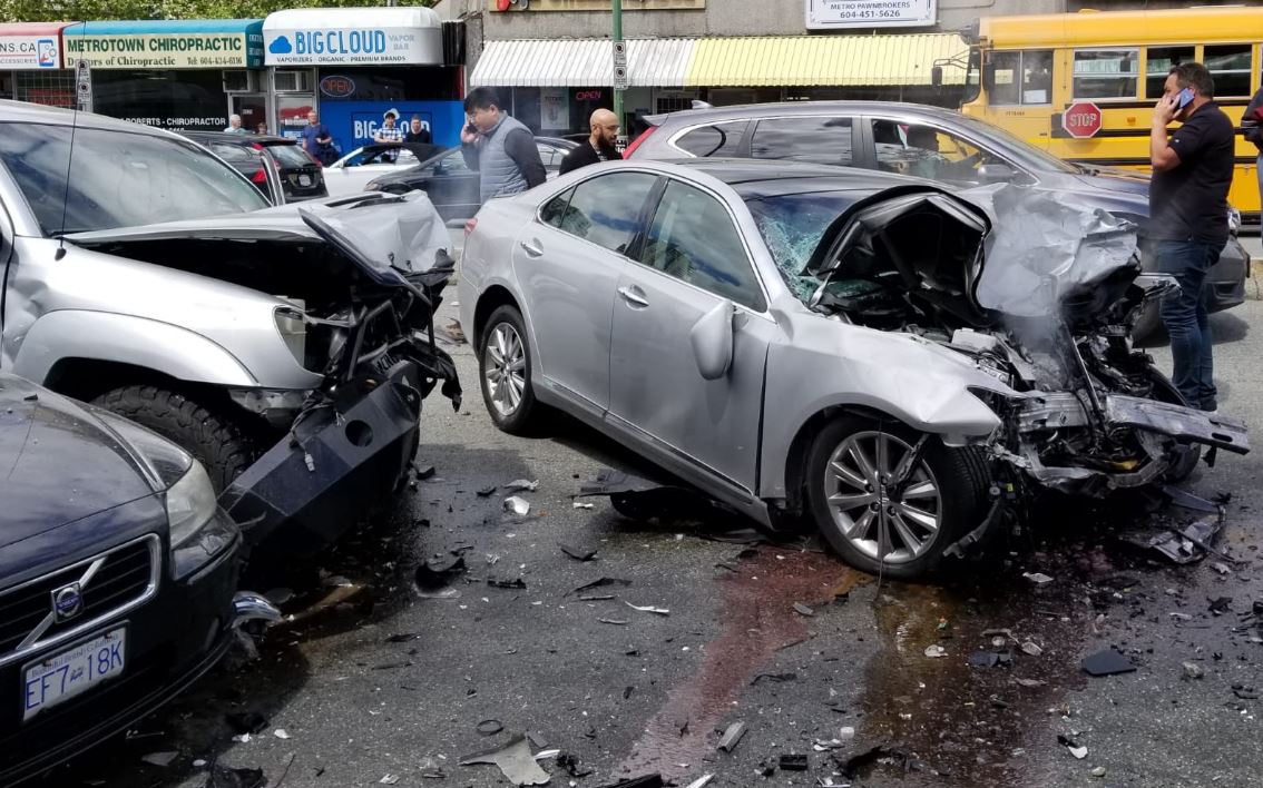Damaged vehicles at the scene of a multi-vehicle crash in Burnaby near Metrotown Friday, June 7, 2019.
