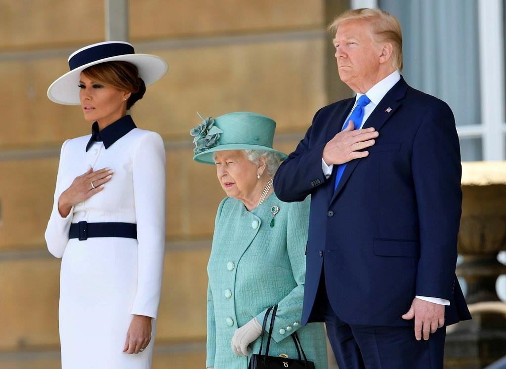 U.S. President Donald Trump and first lady Melania Trump attend a welcome ceremony with Britain’s Queen Elizabeth II in the garden of Buckingham Palace, in London, on June 3, 2019.