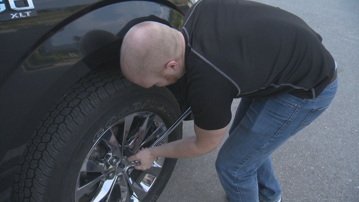 Peachland resident Travis Nixon checks his family's vehicles every day after finding loose lug nuts on one of their tires. 