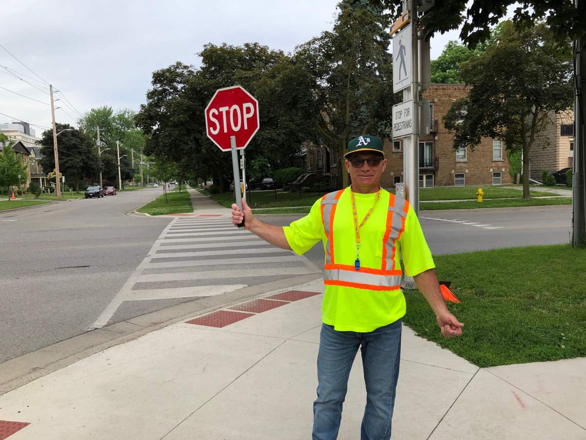 Gary Nutley stands at the corner of Colborne Street and Princess Avenue, where he works as a crossing guard for children at Lord Roberts French Immersion Public School.