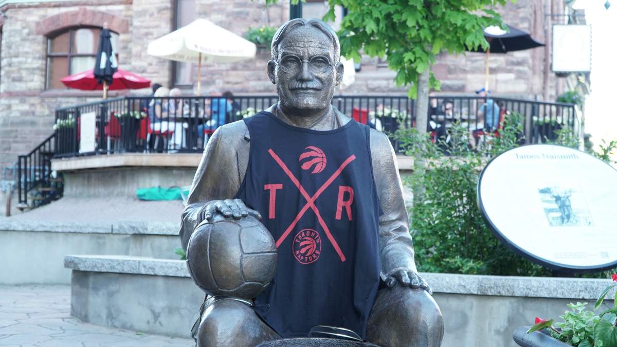 A bronze statue of Dr. James Naismith, the inventor of basketball, wearing Toronto Raptors colours in his hometown of Almonte, Ontario.