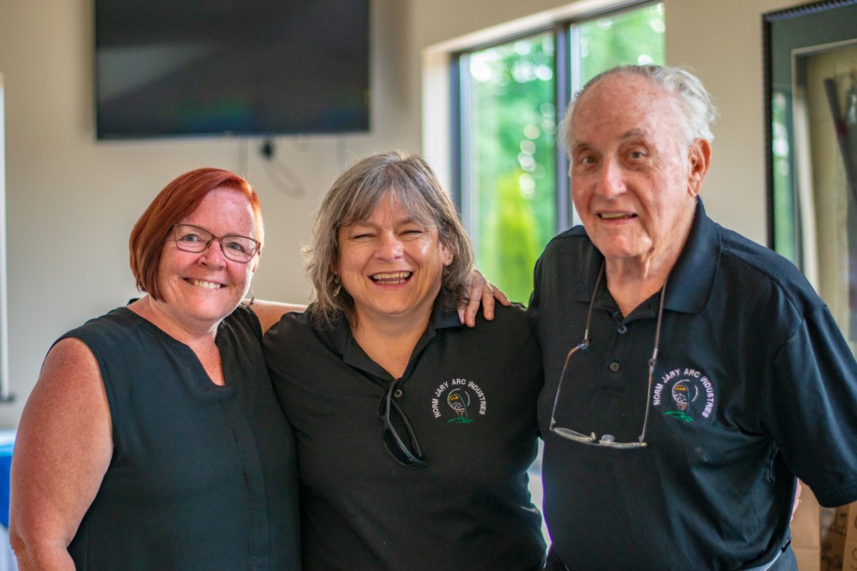 Community Living Guelph Wellington executive director Laura Hanley, event organizer Chris Clark and former mayor and event organizer Norm Jary.