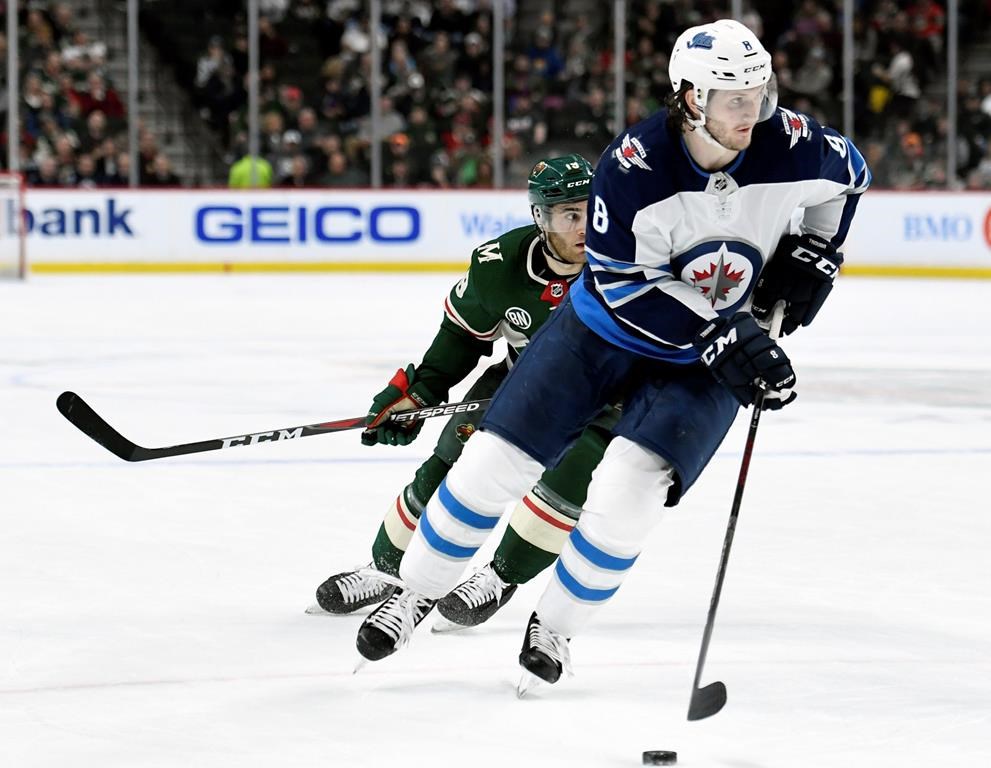 FILE –  The New York Rangers acquired Jacob Trouba (8) from the Jets for defenceman Neal Pionk and the 20th overall pick in the draft. The teams announced the trade Monday, June 17, 2019. (AP Photo/Hannah Foslien, File)