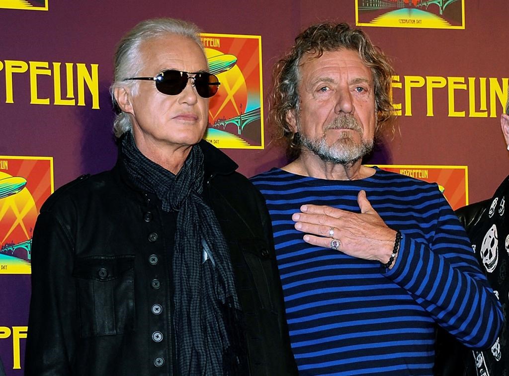 In this Oct. 9, 2012 file photo, Led Zeppelin guitarist Jimmy Page, left, and singer Robert Plant appear at a news conference ahead of the worldwide theatrical release of 'Celebration Day,' a concert film of their 2007 London O2 arena reunion show, in New York City.