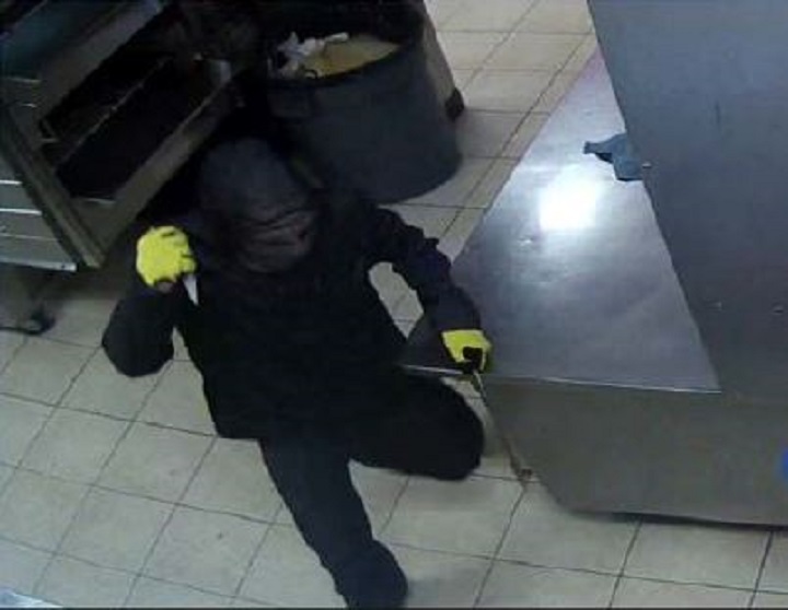 A pizza shop in Penticton was robbed last week. Video surveillance captured the suspect, seen here wielding a knife and a fire poker.