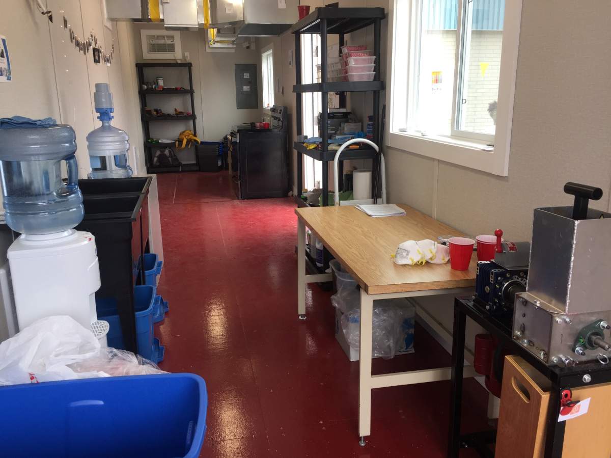 This is what the inside of the 40-foot shipping container looks like. It is equipped with all the necessary tools to sort the plastic, wash it, melt it and compress it into useful products.