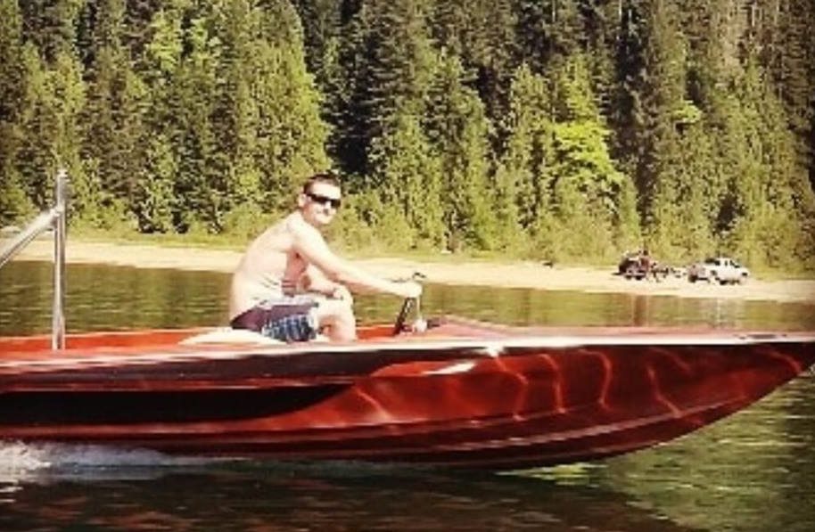 Ryan Ellison, photographed here in a red boat, died Saturday in Osoyoos.