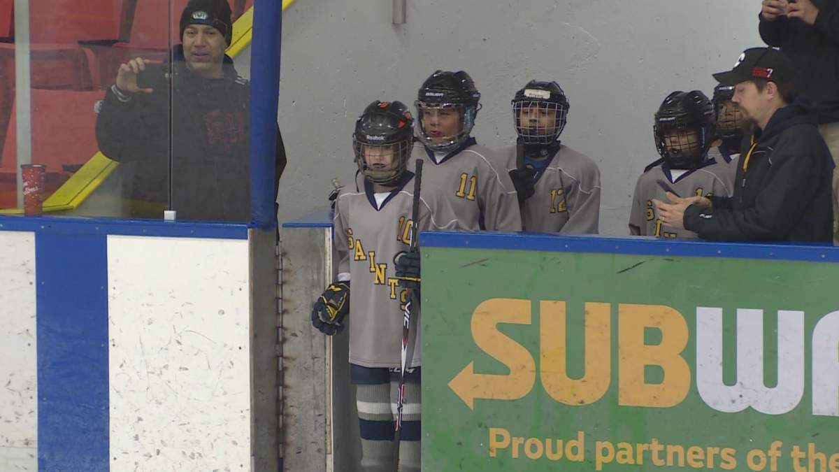 The Calgary Saints prepare to play in 770 CHQR's Minor Hockey Road Show.