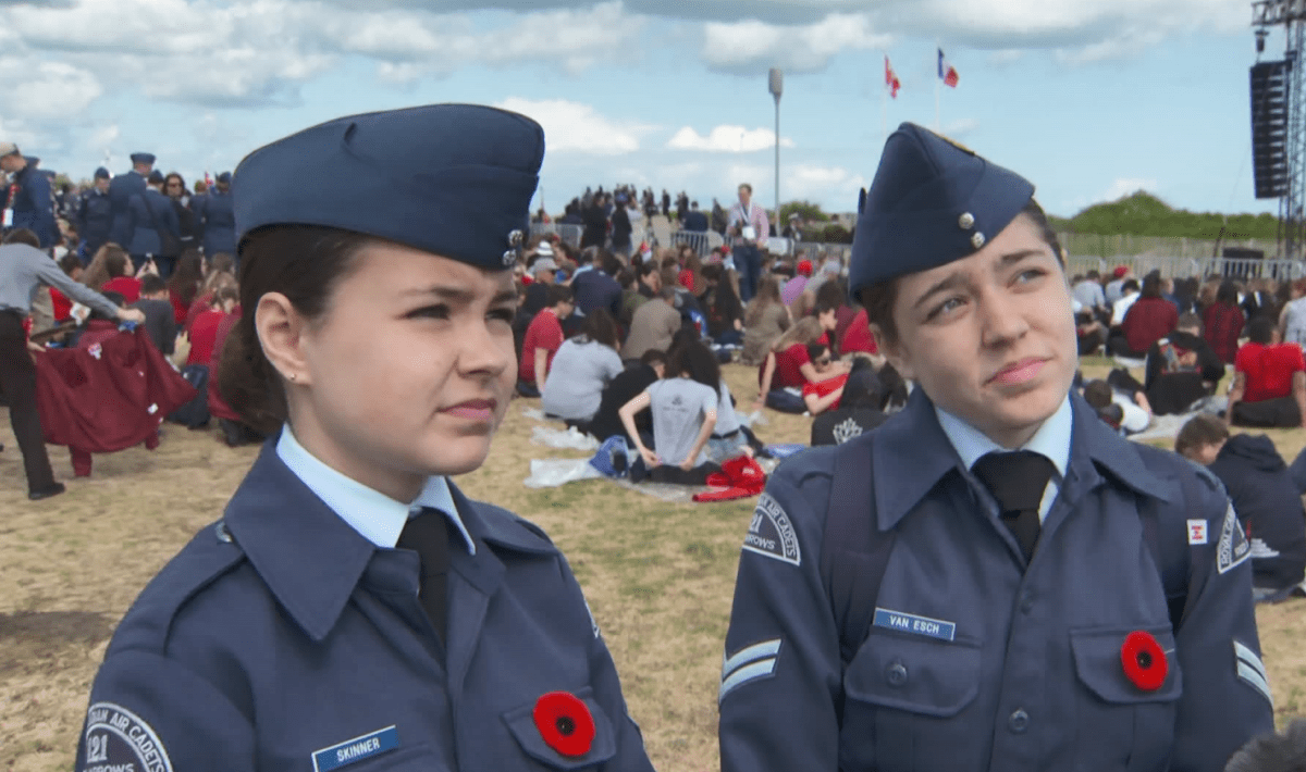 Air cadets corporals Kate Skinner and Aurora Van Esch from the 121 Red Arrows Squadron in Guelph, Ont., commemorate the 75th anniversary of D-Day.