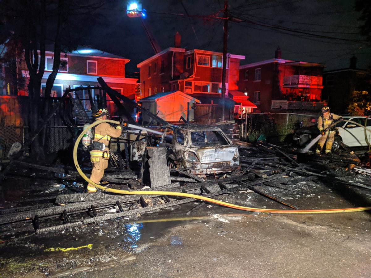 Ottawa fire services say a fire destroyed a garage, a car and damaged two other vehicles early Tuesday morning in Vanier.