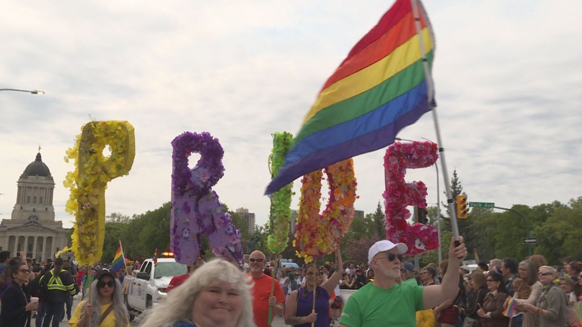 Marchers celebrating in the 2019 Winnipeg Pride Parade.