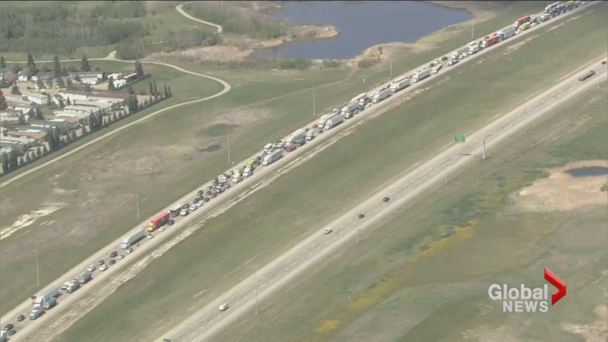 Traffic lined up along Stoney Trail in Calgary after a semi truck collision.