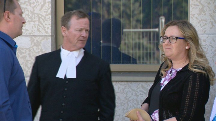 Carolyn Strom meets with her lawyer Marcus Davies outside Regina's Court of Queen's Bench June 4, 2019. 