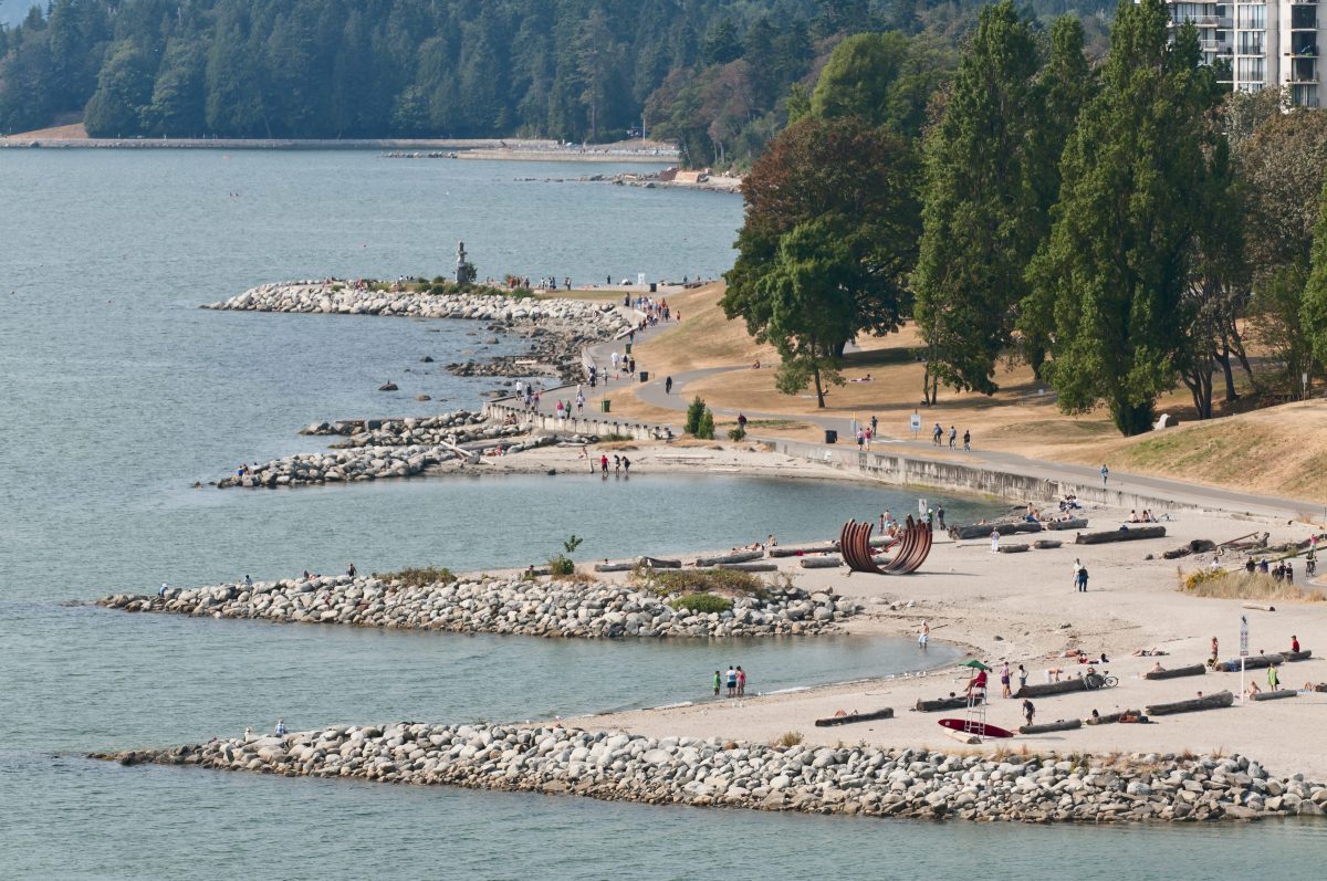 A high angle view of  Sunset Beach at the northeast end of English Bay on the waterfront of Vancouver's West End residential area.