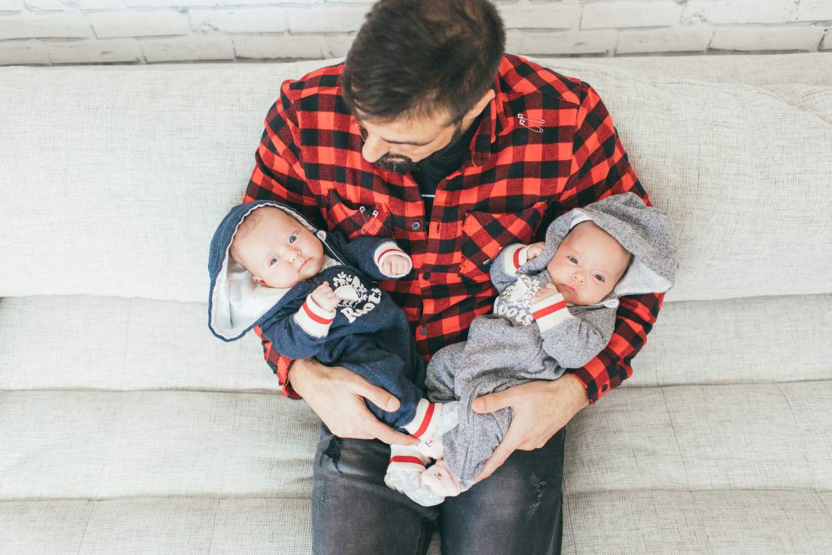 Joseph Tito and his twin daughters.