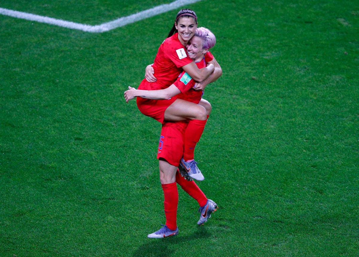 United States' Megan Rapinoe, right, congratulates teammate Alex Morgan after scoring her record-tying fifth goal during the Women's World Cup Group F soccer match between the United States and Thailand at the Stade Auguste-Delaune in Reims, France, Tuesday, June 11, 2019.