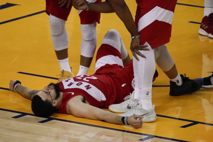 Toronto Raptors guard Fred VanVleet (23) remains on the floor during the second half of Game 4 of basketball’s NBA Finals against the Golden State Warriors in Oakland, Calif., Friday, June 7, 2019.