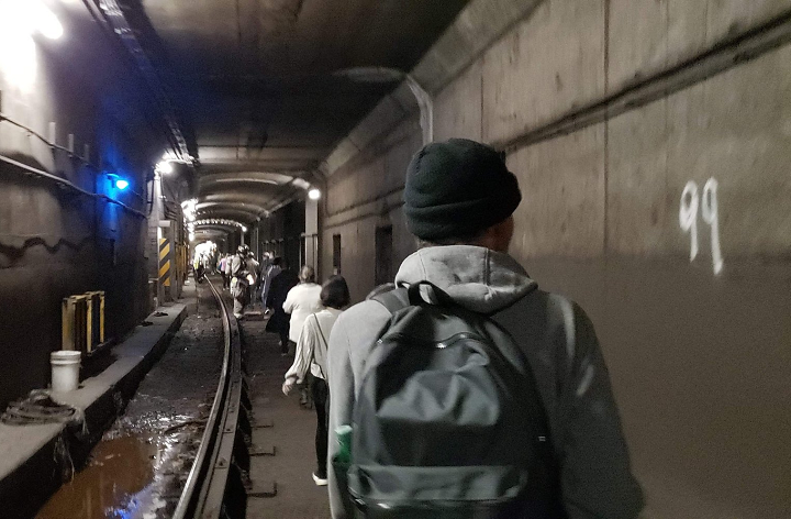Photos posted to social media showed people being evacuated through subway tunnels following the incident Wednesday.