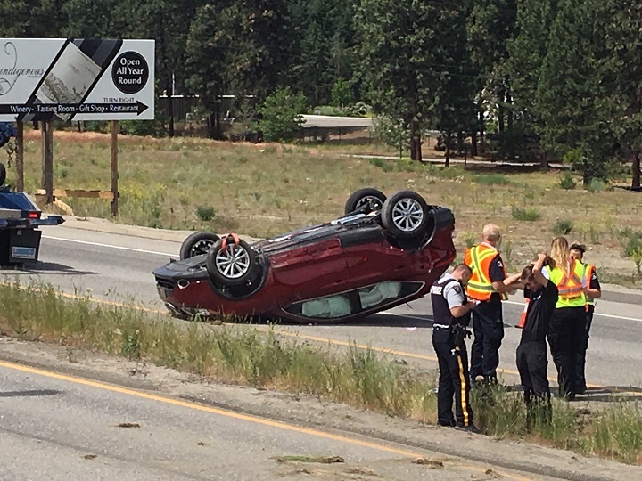 Emergency crews attend an accident along Highway 97 in West Kelowna in which a Nissan SUV ended up on its roof. The accident affected both the southbound and northbound lanes.  
