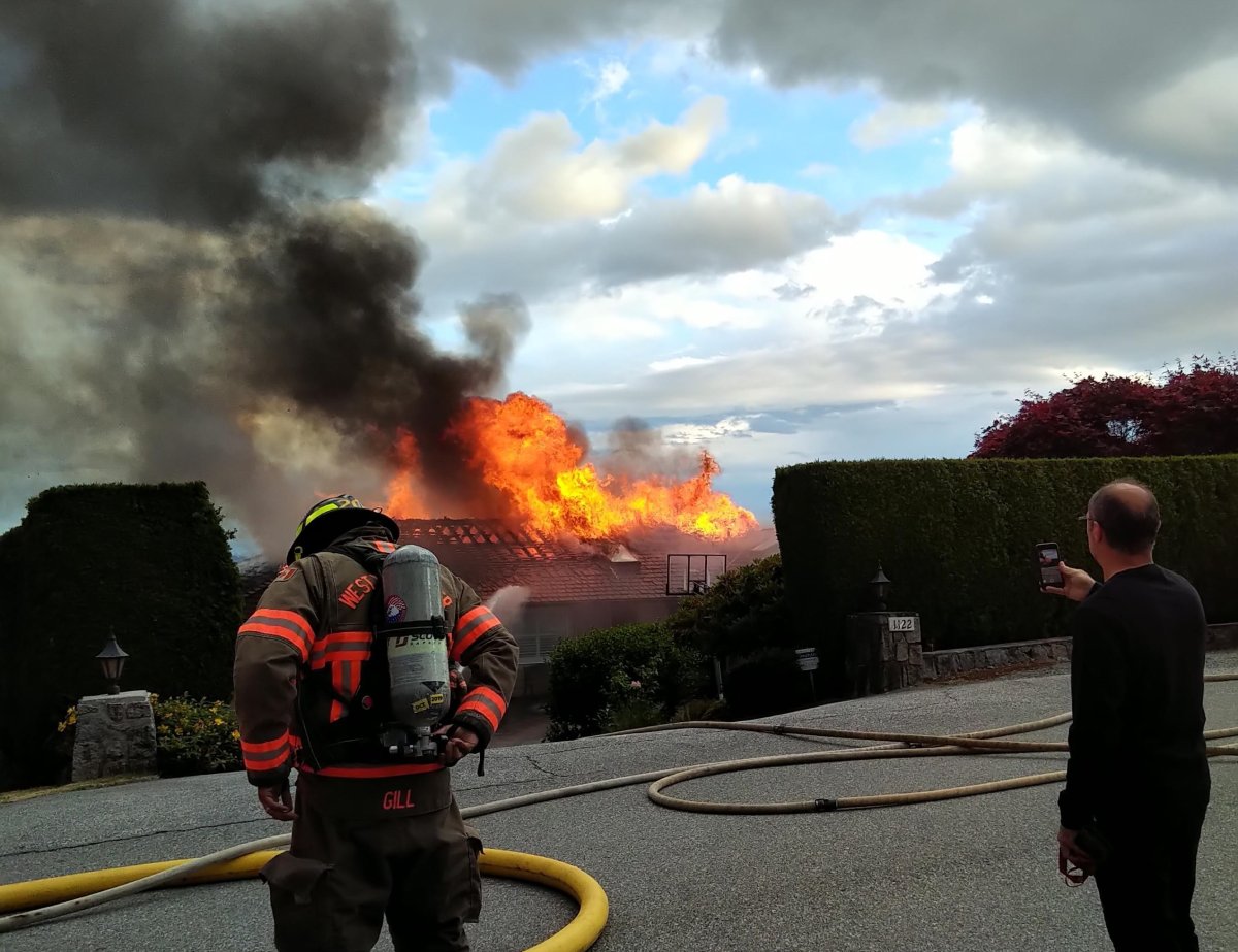 Firefighters prepare to tackle a large blaze in West Vancouver. 