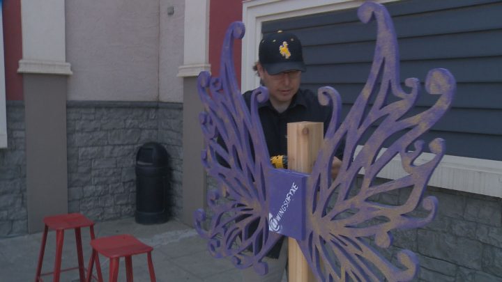Loch Willy puts up a set of wings in front of Jerry’s Food Emporium.