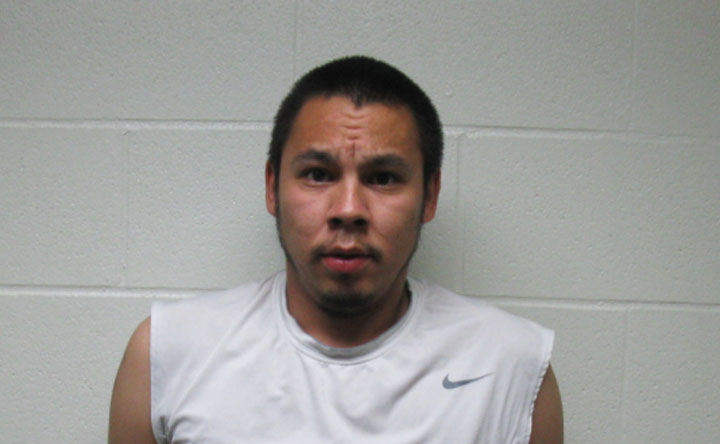 Wolfgang Amadeus McKenzie, who is facing charges in relation to a shooting in northern Saskatchewan, has turned himself in to police.