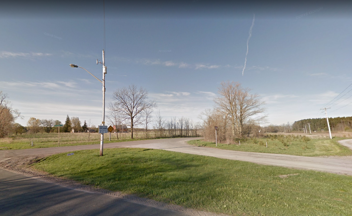 A hydro pole is shown at the corner of Woodhill Road and Concession 4 Road outside of Hamilton, Ont.