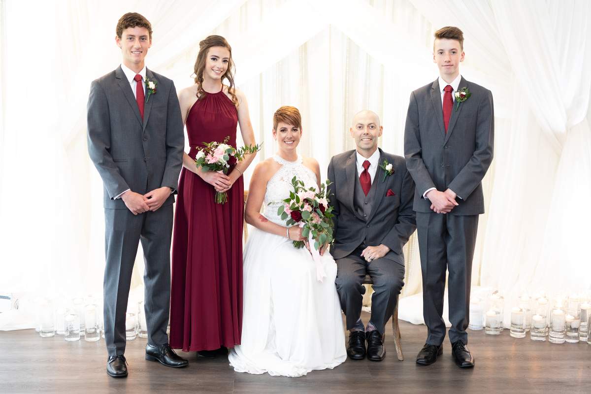 Jenny, Gregg, and her three children.