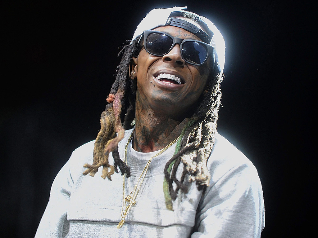 In this Dec. 5, 2015, file photo, Lil Wayne performs during Hot 97’s ‘Busta Rhymes & Friends: Hot For The Holidays’ at the Prudential Center in Newark, N.J.