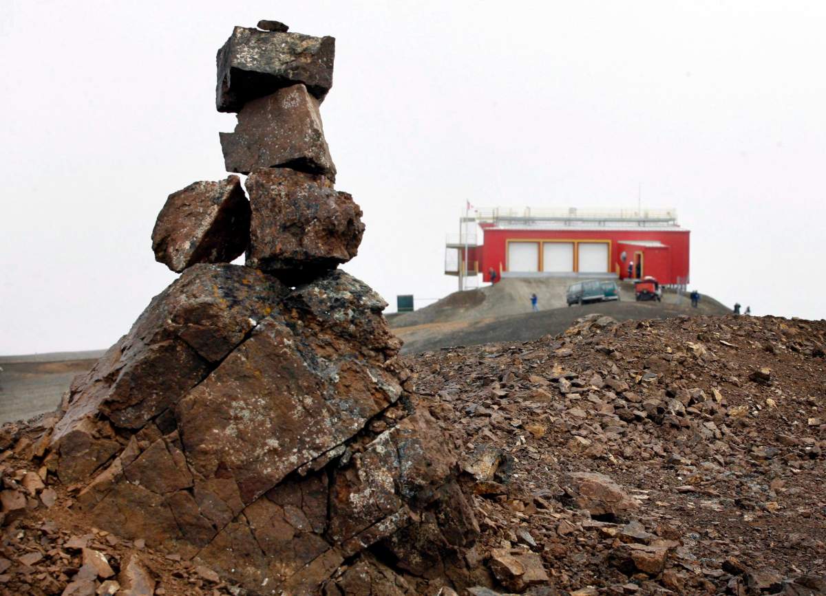 A rock cairn marks a high point near the Polar Environmental Atmospheric Research Laboratory (PEARL) near the Eureka Weather Station, on Ellesmere Island, Nunavut, on Monday, July 24, 2006. 
