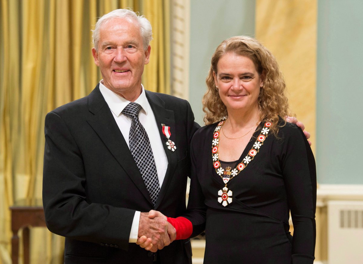 Governor General Julie Payette invests Paul Albrechtsen, from Winnipeg, Man. as a Member of the Order of Canada during a ceremony at Rideau Hall Wednesday January 24, 2018 in Ottawa. 