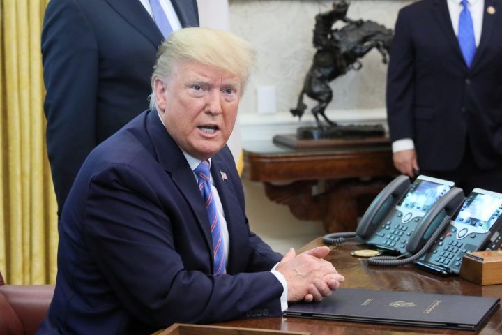 U.S. President Donald Trump speaks while participating in a border funding legislation signing ceremony in the Oval Office of the White House in Washington, U.S. July 1, 2019.