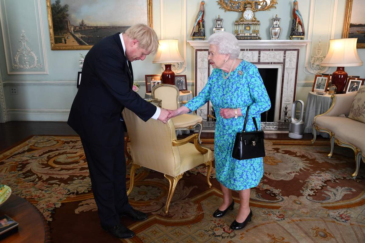 Queen Elizabeth II welcomes Boris Johnson during an audience in Buckingham Palace, where she will officially recognise him as the new Prime Minister, in London, Britain July 24, 2019.