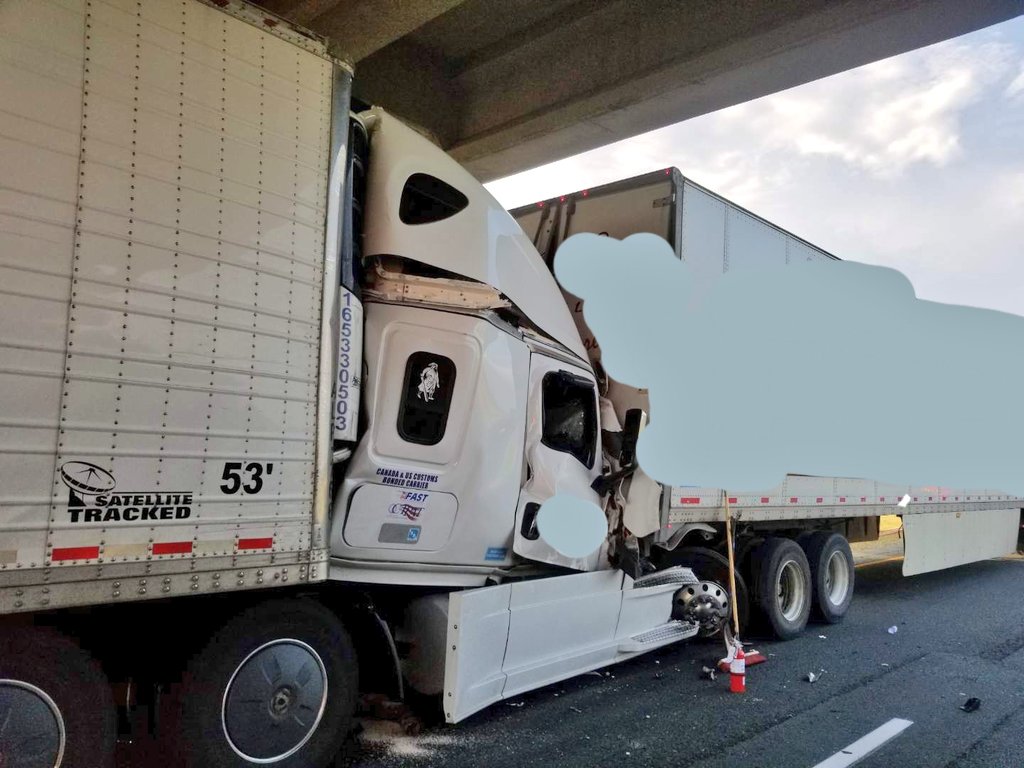 The crash happened along the eastbound lanes of Hwy. 401 near Iona Road. Note this photo has been altered by the OPP to remove truck branding.