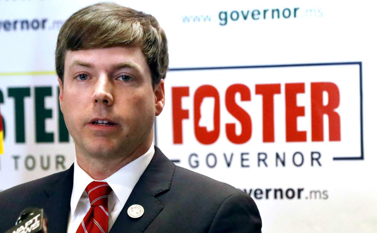 State Rep. Robert Foster, R-Hernando, speaks with reporters as he discusses his reasons for running for governor of Mississippi, Tuesday, Jan. 8, 2019, at the state GOP headquarters in Jackson, Miss. 