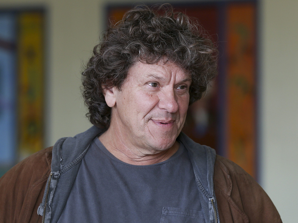 In this Wednesday, Oct. 14, 2015, file photo, Michael Lang speaks during a tour at the former Zena Elementary School in Woodstock, N.Y.