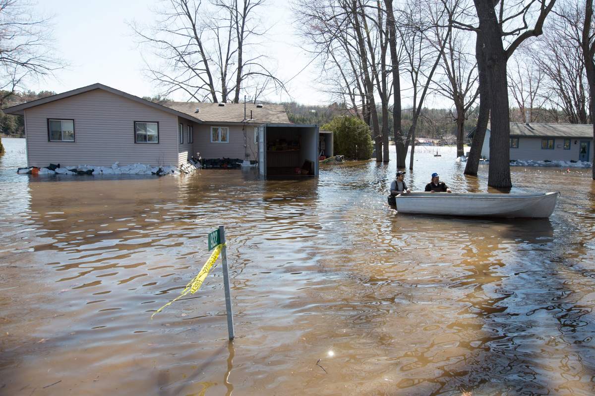 Flood water surround a home in Constance Bay, Ontario on Sunday, April 28, 2019.