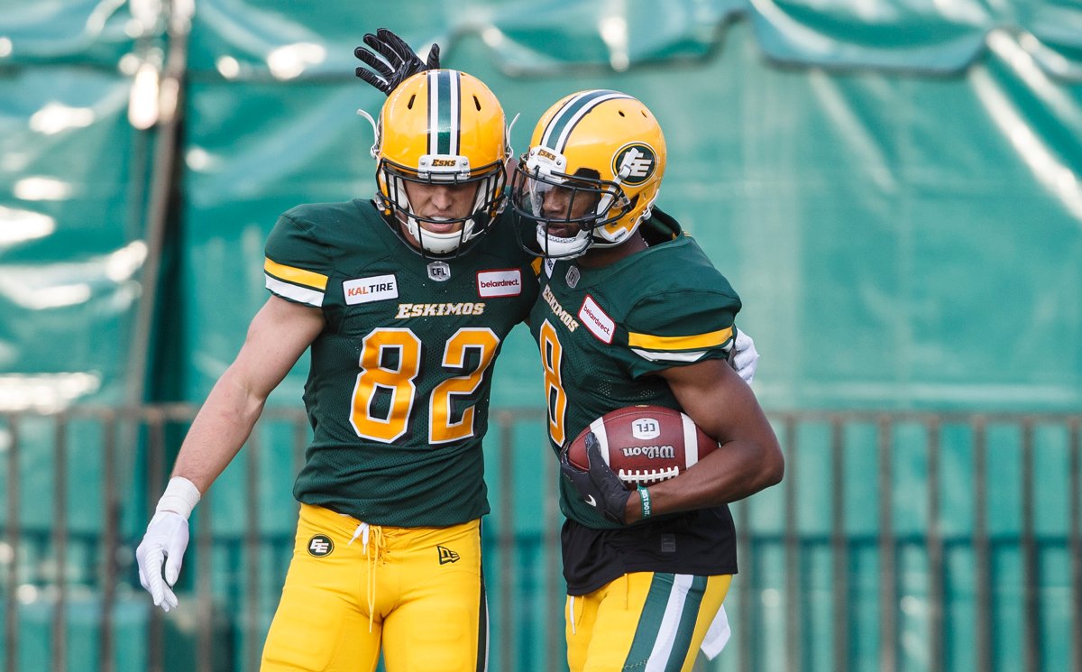 Edmonton Eskimos Greg Ellingson (82) and Kenny Stafford (8) celebrate a touchdown against the Montreal Alouettes during first half CFL action in Edmonton on Friday June 14, 2019. 