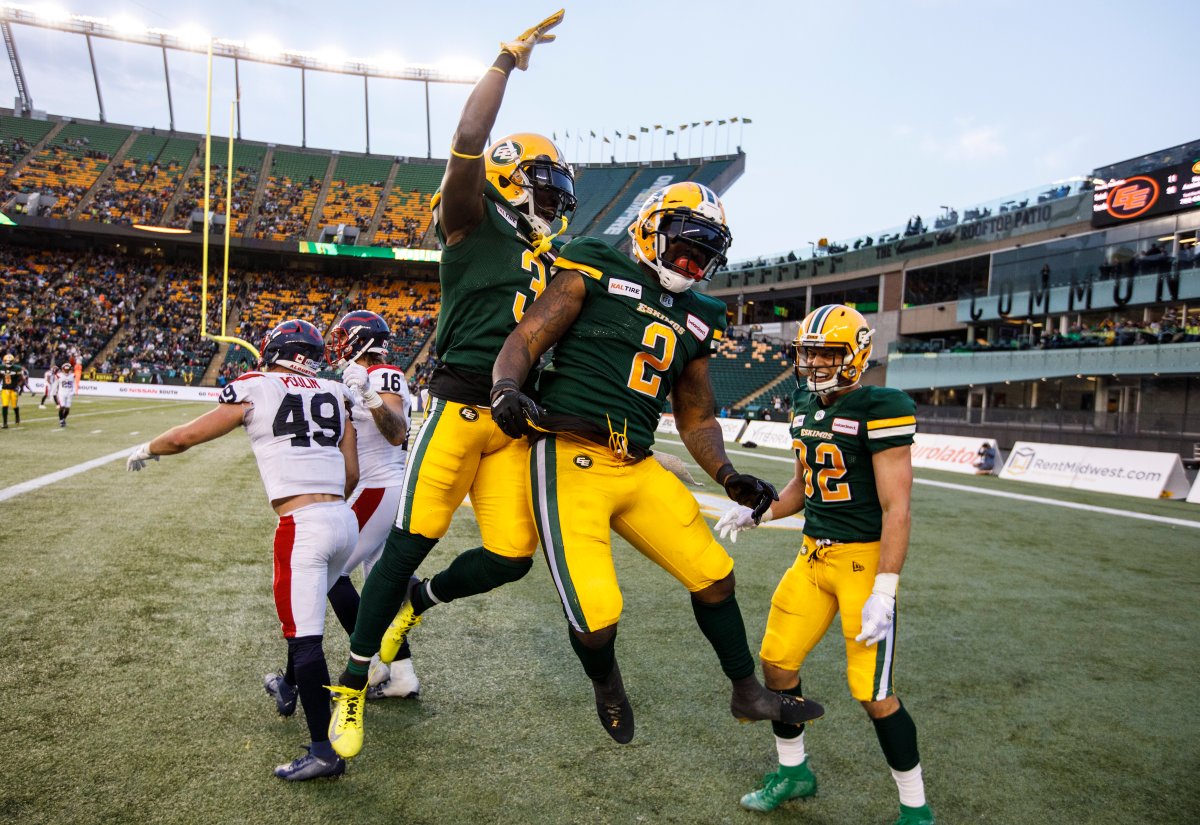 Edmonton Eskimos' C.J. Gable (2), Natey Adjei (3) and Greg Ellingson (82) celebrate a touchdown against the Montreal Alouettes during second half CFL action in Edmonton, Alta., on Friday June 14, 2019. 