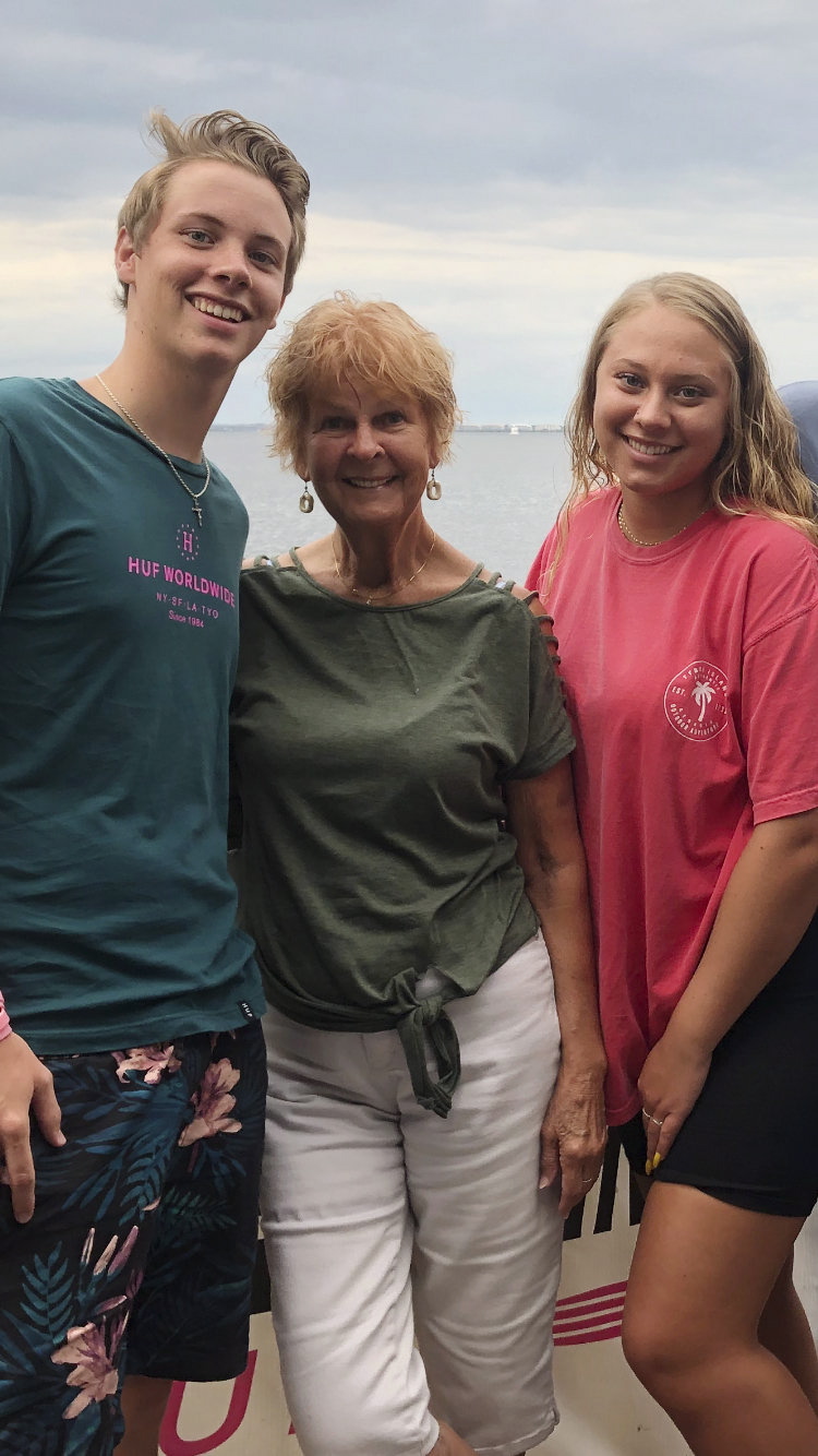 In this undated photo made available by Wade J. Fleming, Lynn Fleming is seen with her grandchildren, Jonathan and Jensen Fleming. Photo via AP