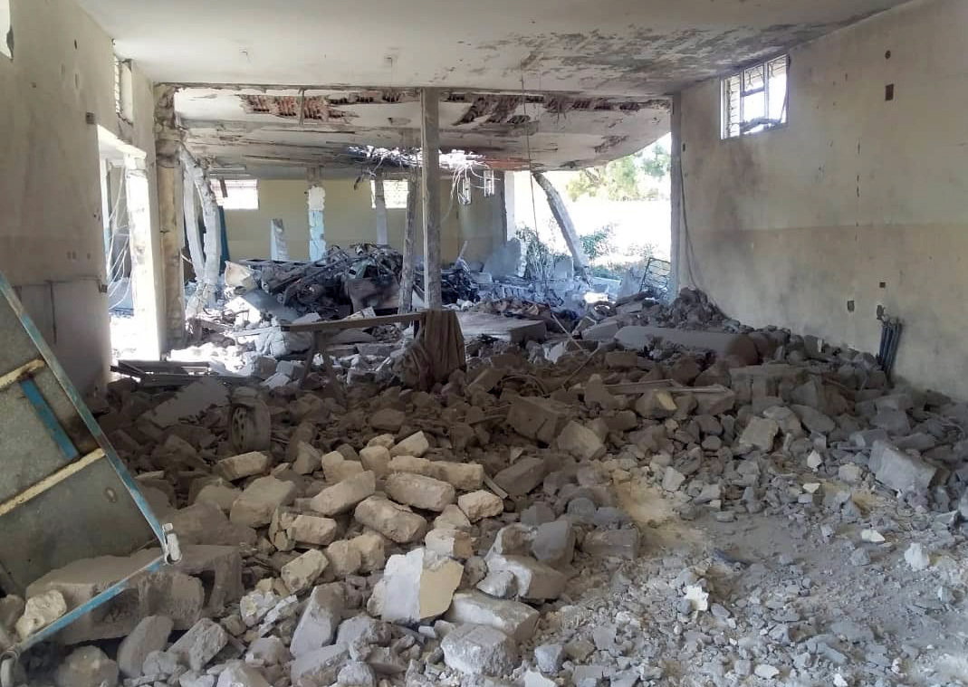 This image taken on a mobile phone on Wednesday July 3, 2019 shows the damage inside the detention center in Tripoli’s Tajoura neighborhood after an airstrike. Libyan officials say an airstrike has struck a detention center for migrants in the capital, killing at least 40 people and wounding dozens.