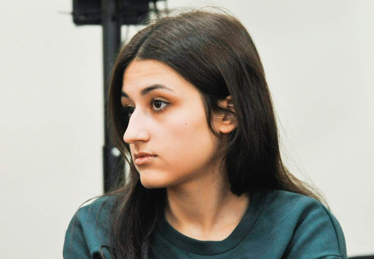 In this photo taken on Wednesday, June 26, 2019, Maria Khachaturyan attends hearings in a court room in Moscow, Russia. (Alexander Avilov, Moscow News Agency photo via AP)
