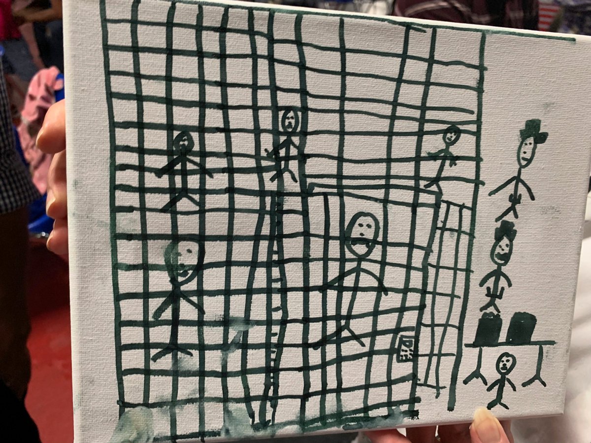 This undated photo provided by the American Academy of Pediatrics on Friday, July 5, 2019 shows a drawing by a migrant child at the Catholic Charities Humanitarian Respite Center in McAllen, Texas.