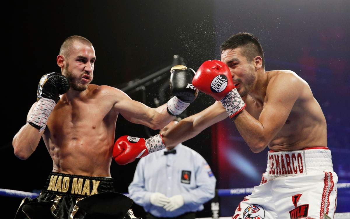 In this Oct. 20, 2018, file photo, Maxim Dadashev of Russia, left, hits Antonio DeMarco of Mexico during a junior welterweight bout in Las Vegas, Nev.